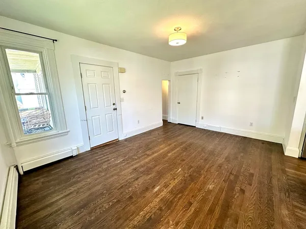 a view of an empty room and window