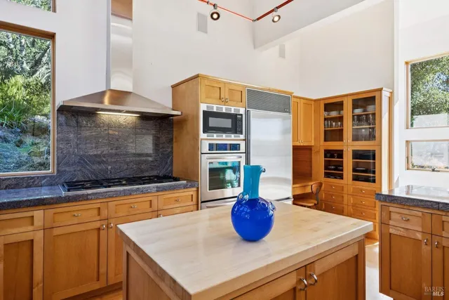 a chair and a table in a kitchen