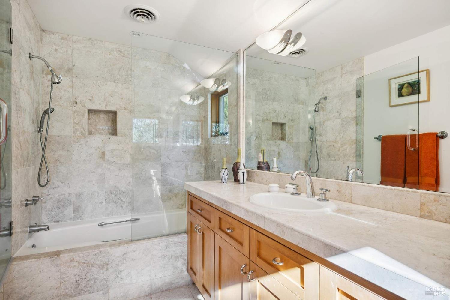 10300 Slattery Road Kenwood, CA 95452 - Photo 23 of 35 a bathroom with a granite countertop sink mirror and shower