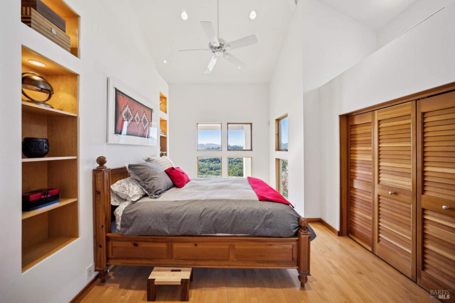 10300 Slattery Road Kenwood, CA 95452 - Photo 24 of 35 a living room with furniture and a floor to ceiling window
