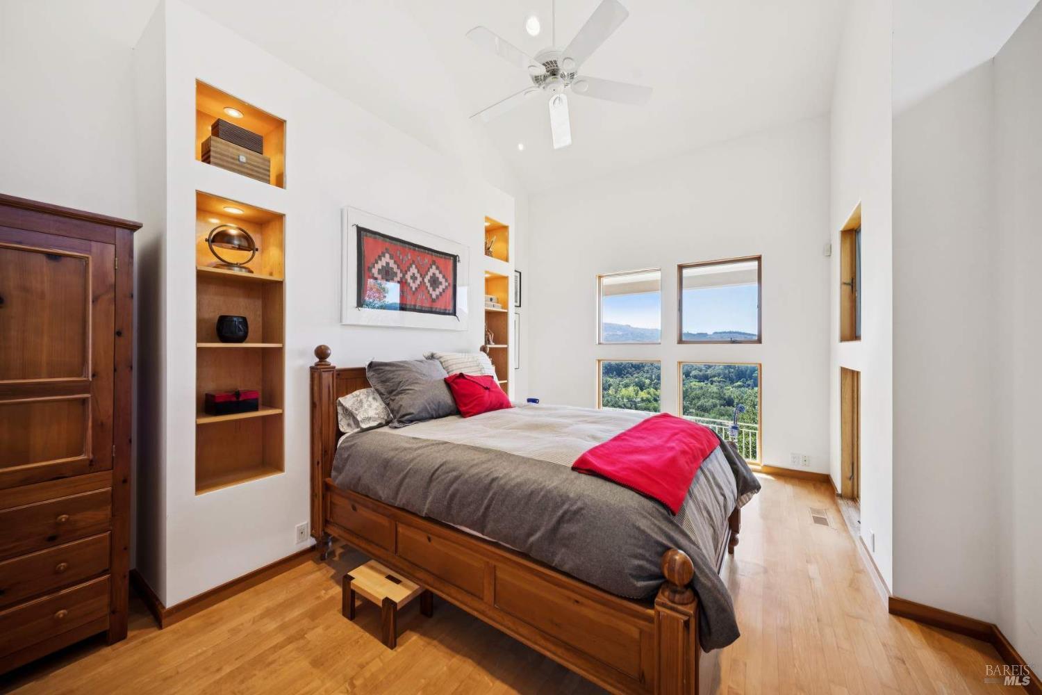 10300 Slattery Road Kenwood, CA 95452 - Photo 25 of 35 a bedroom with a bed and a window