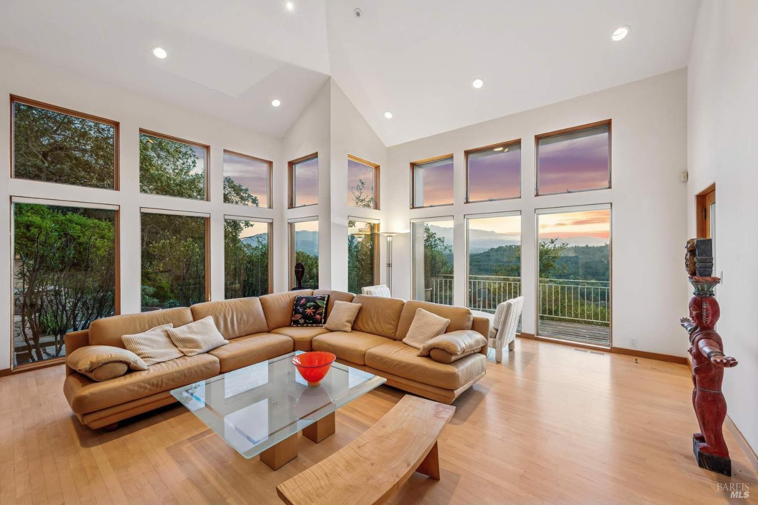 10300 Slattery Road Kenwood, CA 95452 - Photo 9 of 35 a living room with furniture and floor to ceiling windows