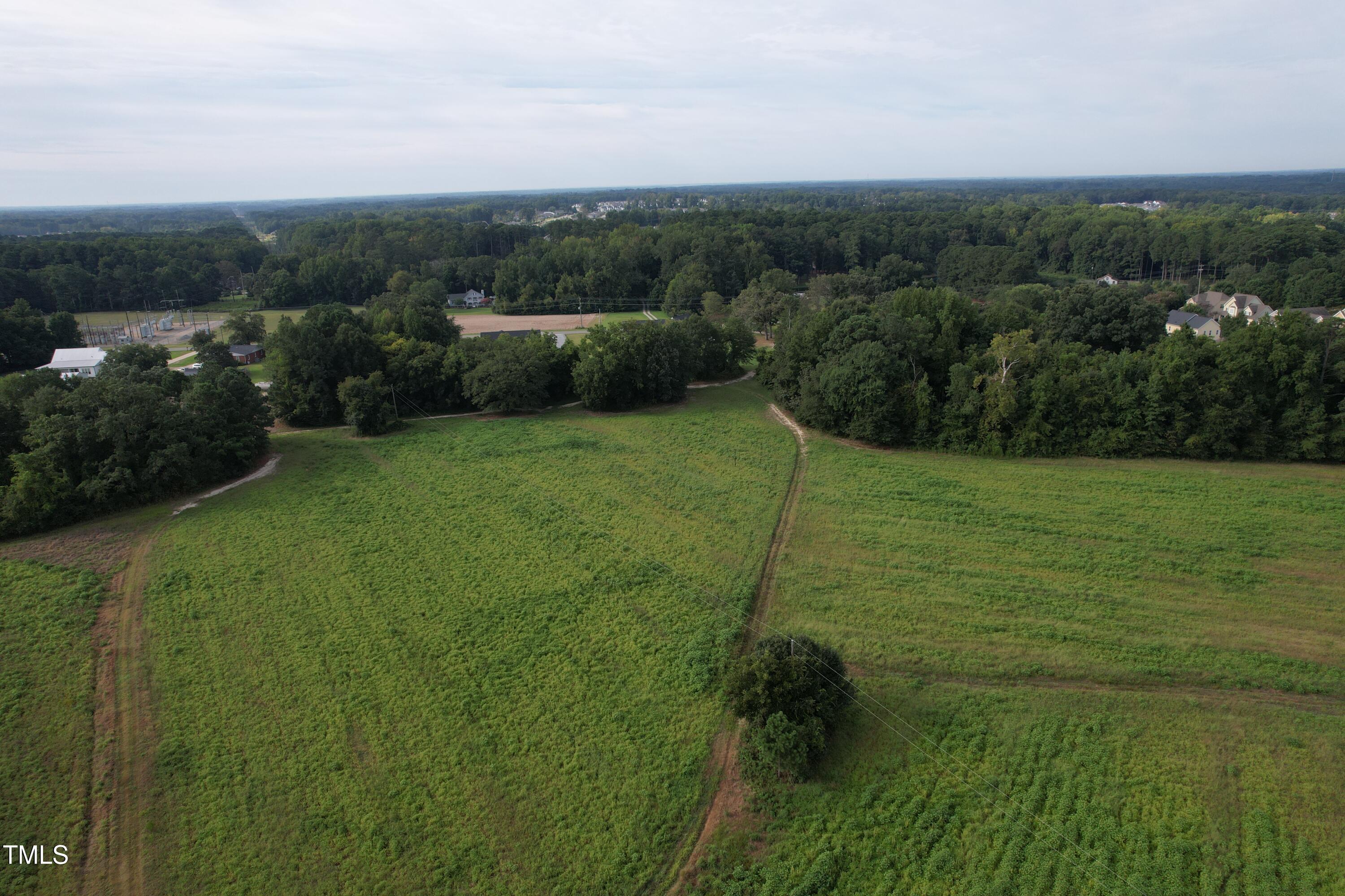1103 Holland Road Fuquay-Varina, NC 27526 - Photo 5 of 10 a view of a field with an ocean