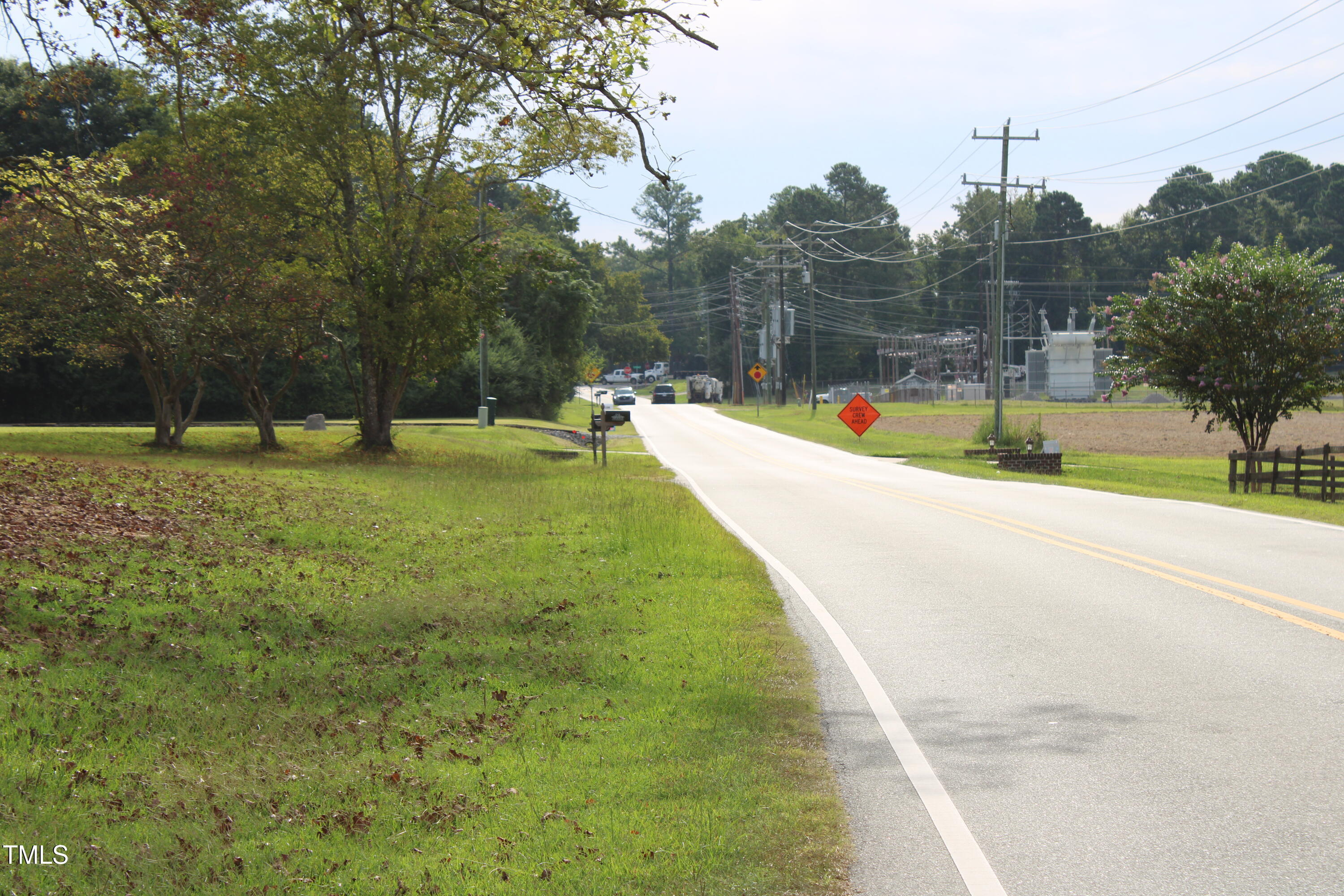 1103 Holland Road Fuquay-Varina, NC 27526 - Photo 7 of 10 a view of a swimming pool with a yard