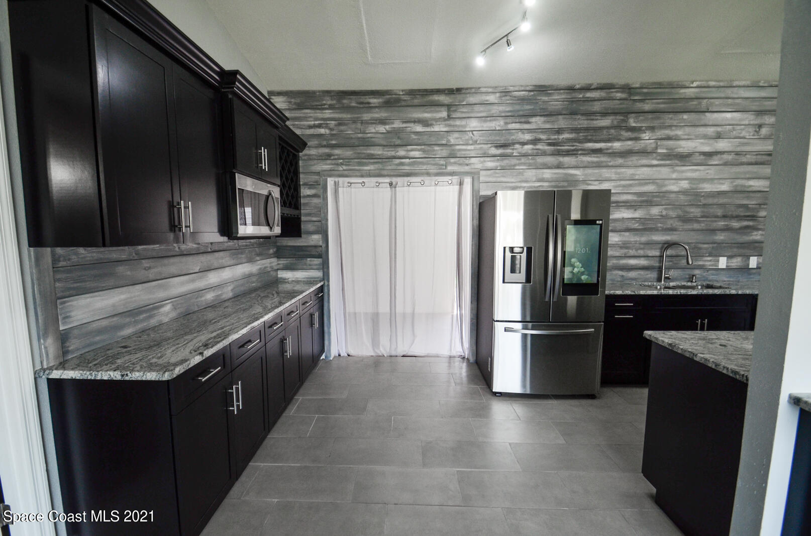 7005 Bismark Road Cocoa, FL 32927 - Photo 5 of 37 DSC_2830