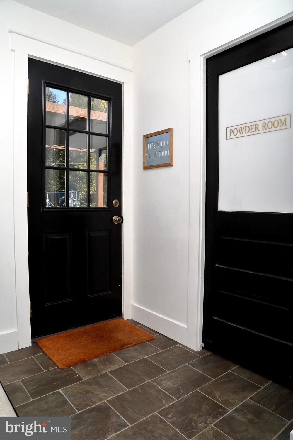 1541 Robert Road Lancaster, PA 17601 - Photo 15 of 34 Mudroom to backyard. Pocket door leads to bath