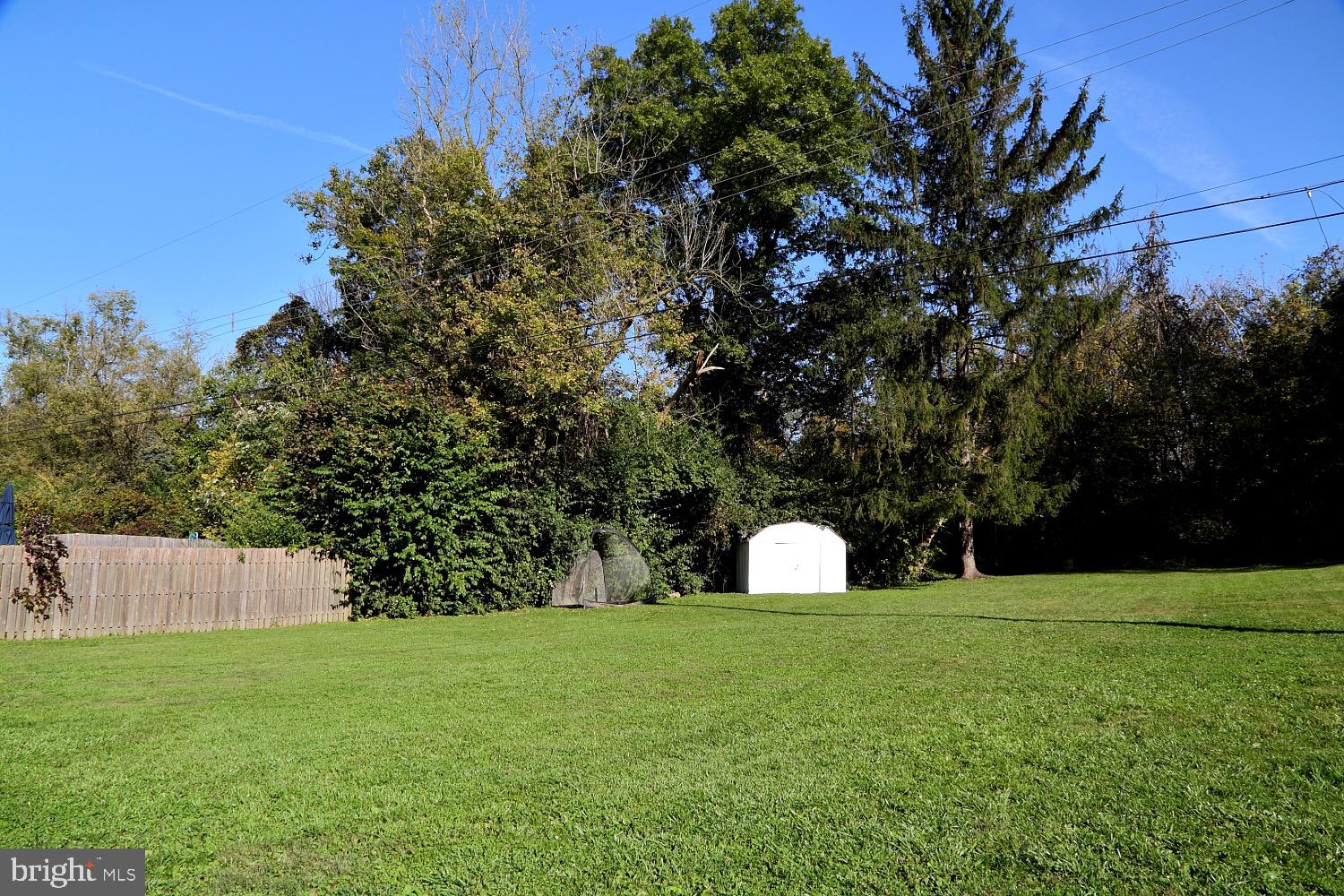 1541 Robert Road Lancaster, PA 17601 - Photo 31 of 34 Large flat rear yard with wooded adventure beyond!