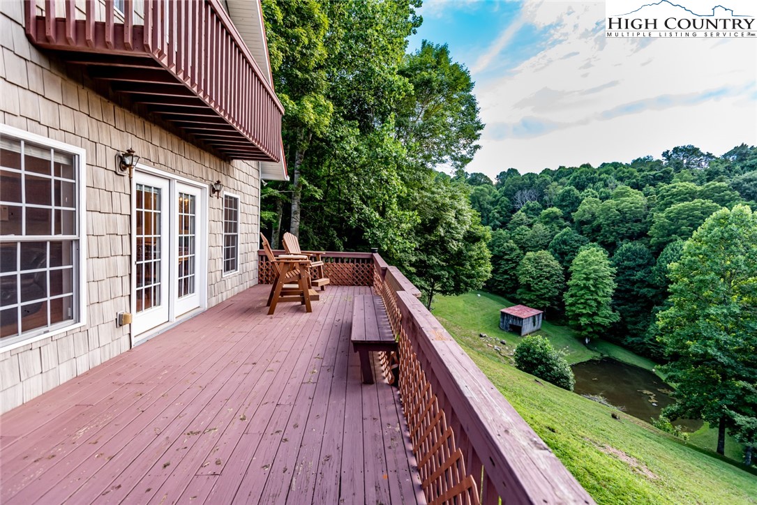 1195 Long Branch Road Lansing, NC 28643 - Photo 12 of 31 a view of balcony with deck and yard