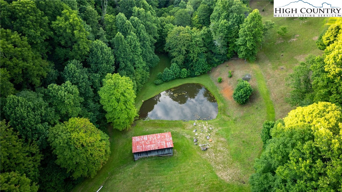 1195 Long Branch Road Lansing, NC 28643 - Photo 14 of 31 an aerial view of a house with a yard