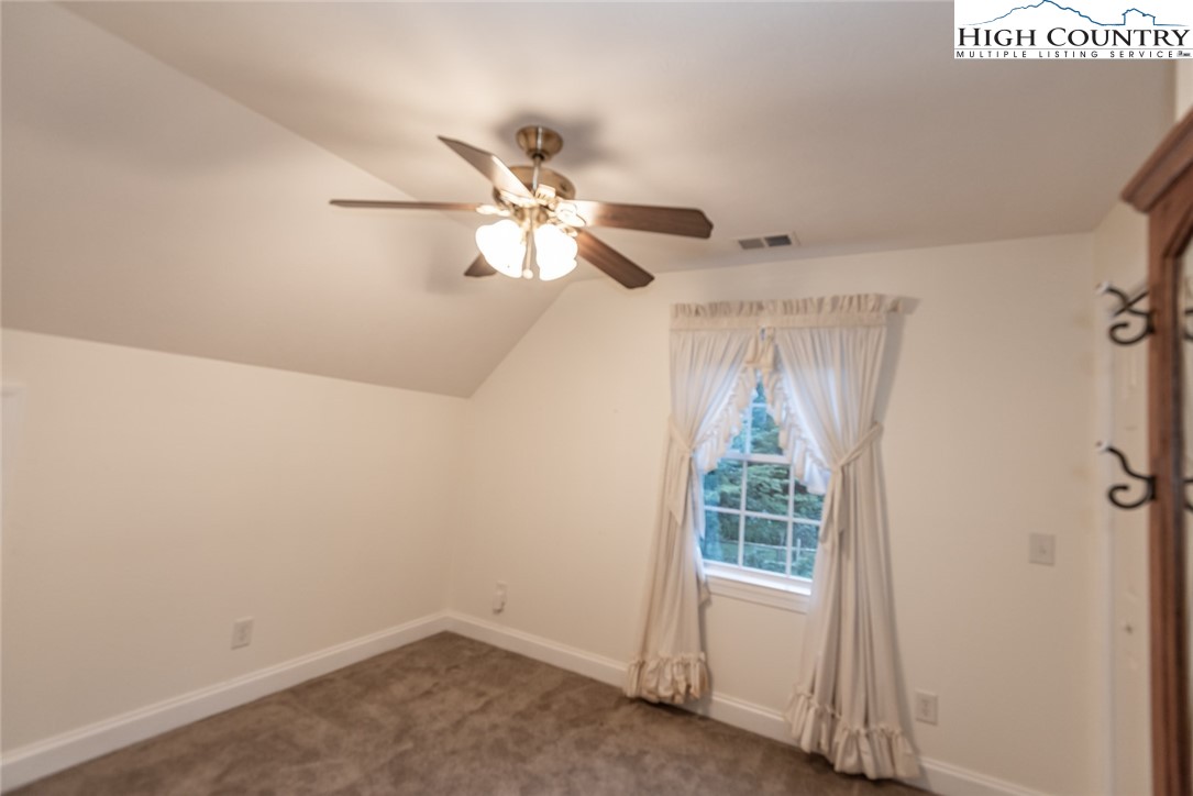 1195 Long Branch Road Lansing, NC 28643 - Photo 23 of 31 a view of an empty room with a window