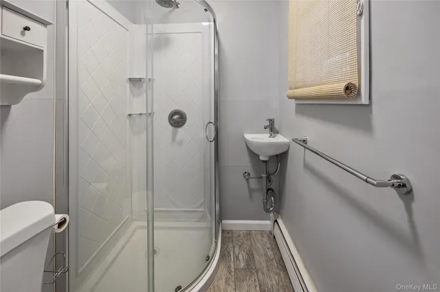 a bathroom with a sink and toilet