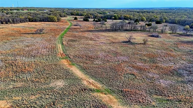 a view of a wooden floor and a lake view
