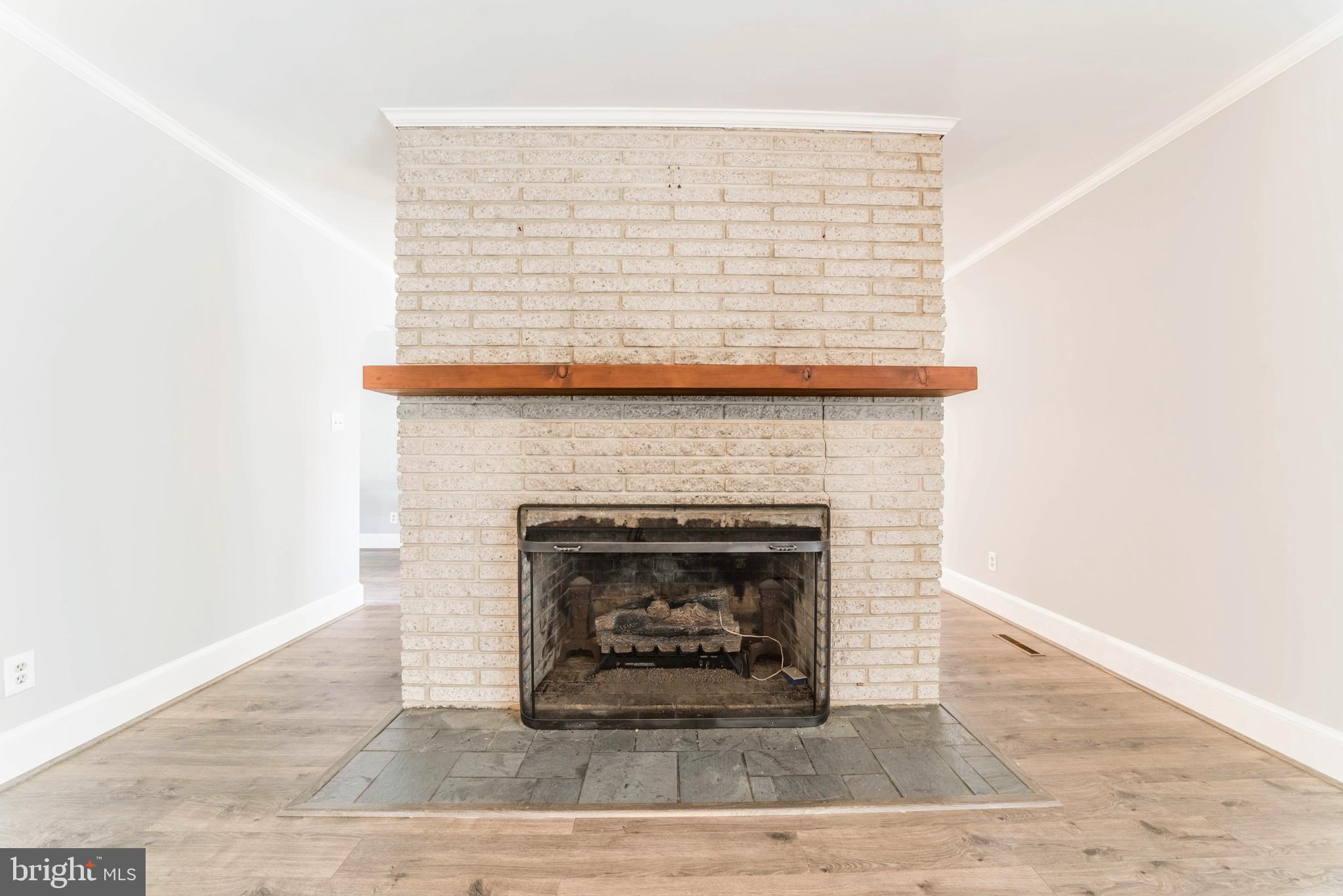 18641 Point Lookout Road Park Hall, MD 20667 - Photo 11 of 40 Beautiful brick fireplace