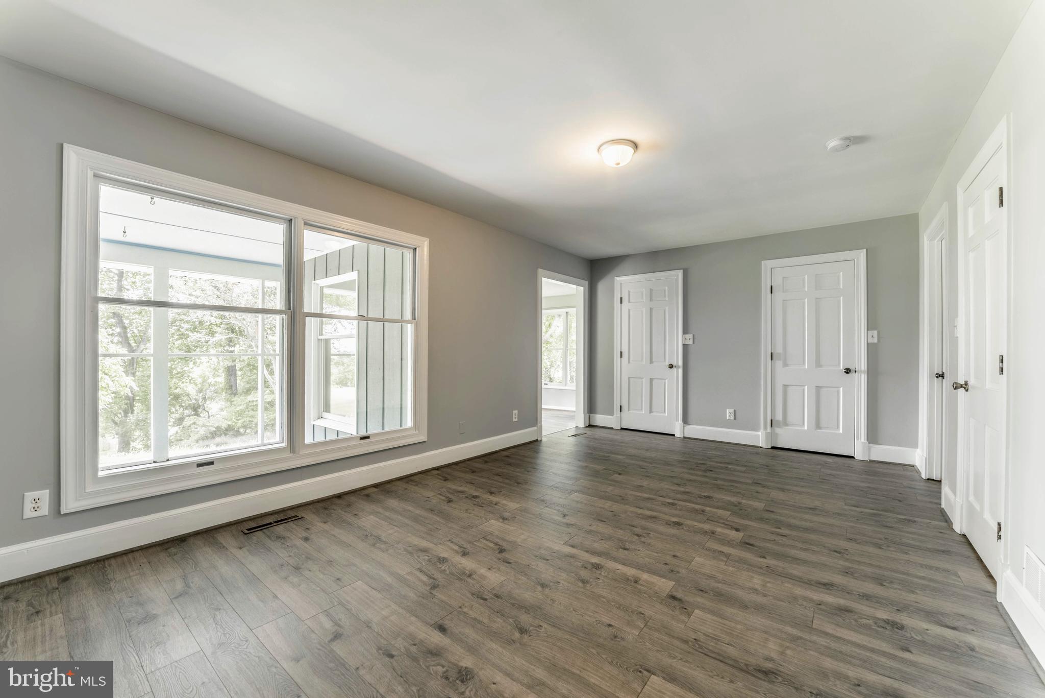 18641 Point Lookout Road Park Hall, MD 20667 - Photo 13 of 40 Master bedroom w/view of the River and sitting rm