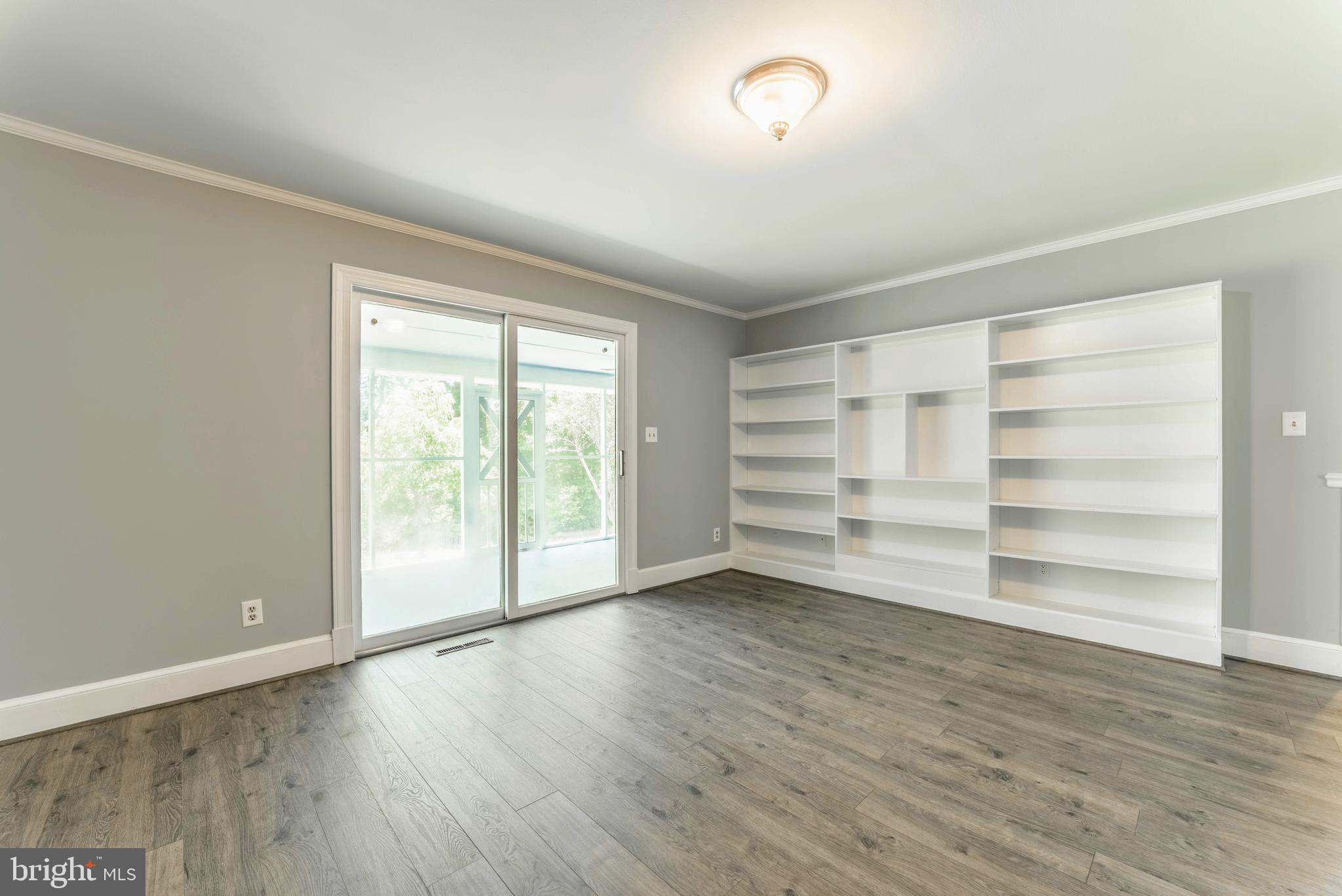 18641 Point Lookout Road Park Hall, MD 20667 - Photo 14 of 40 Family Room with built in book cases