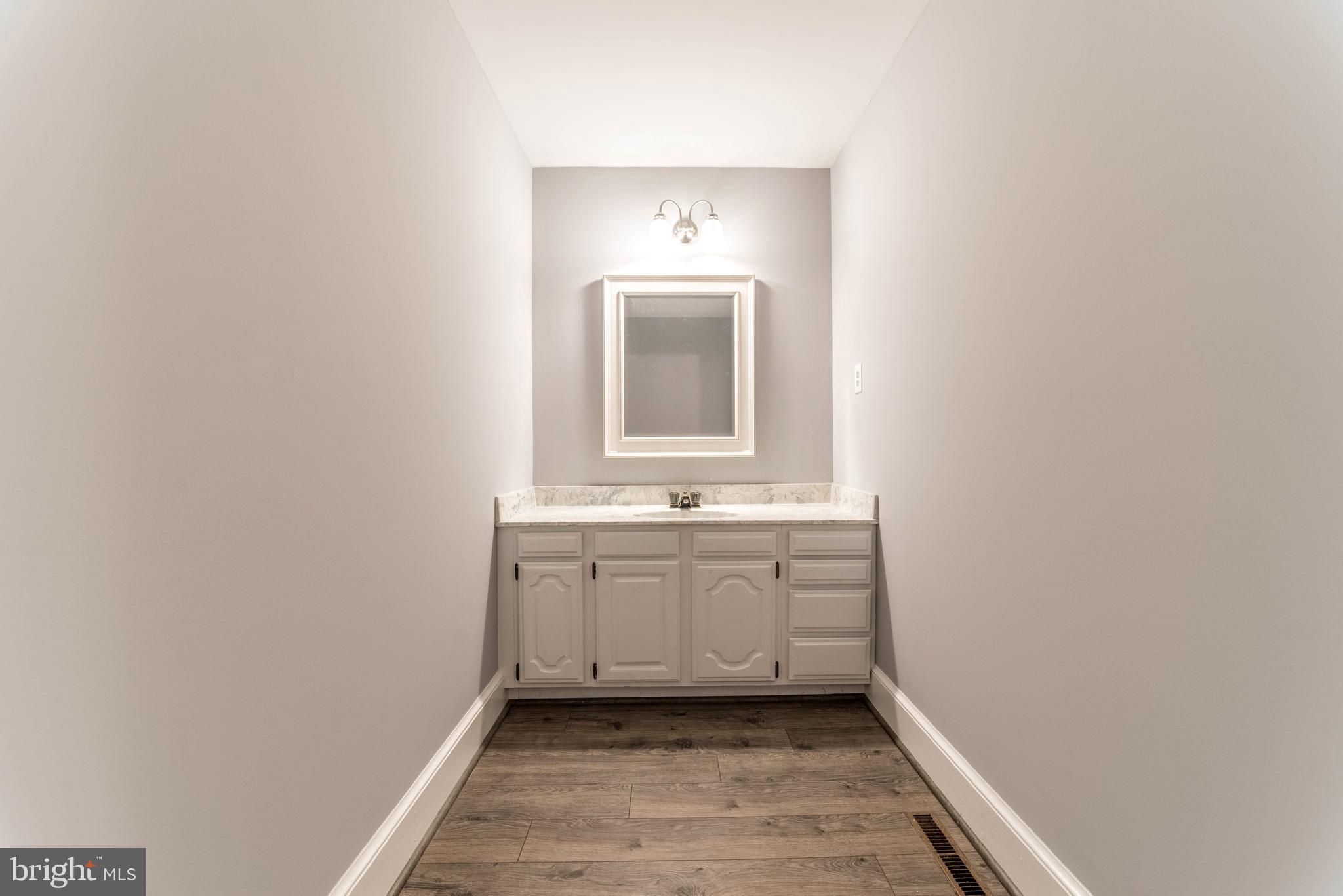 18641 Point Lookout Road Park Hall, MD 20667 - Photo 19 of 40 Vanity inside master bedroom