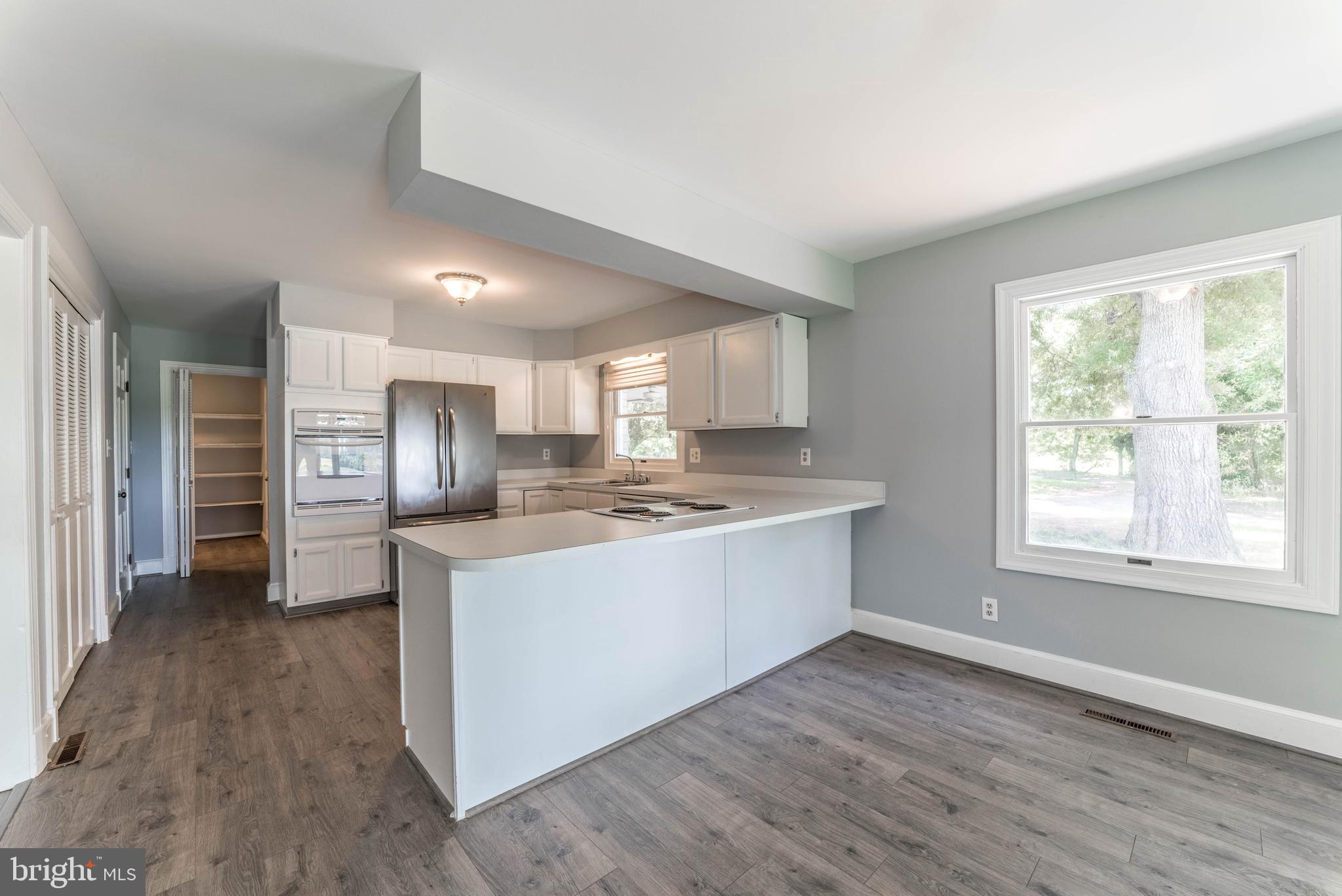 18641 Point Lookout Road Park Hall, MD 20667 - Photo 6 of 40 Kitchen w/eat in area and island, w/views of water