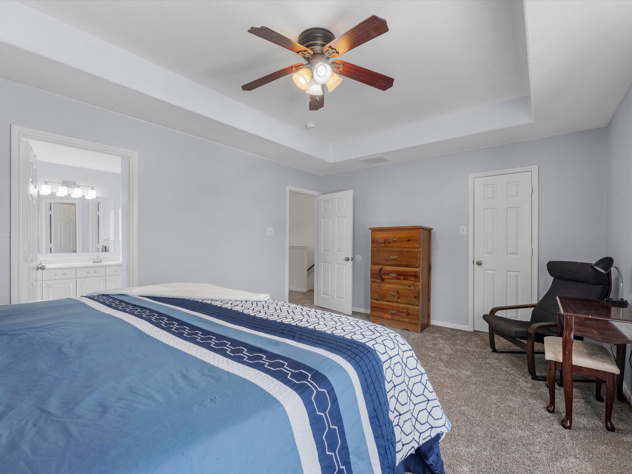 22422 Lamaster Lane Spring, TX 77373 - Photo 20 of 35 Primary bedroom includes a full ensuite bathroom, offering both comfort and convenience.
