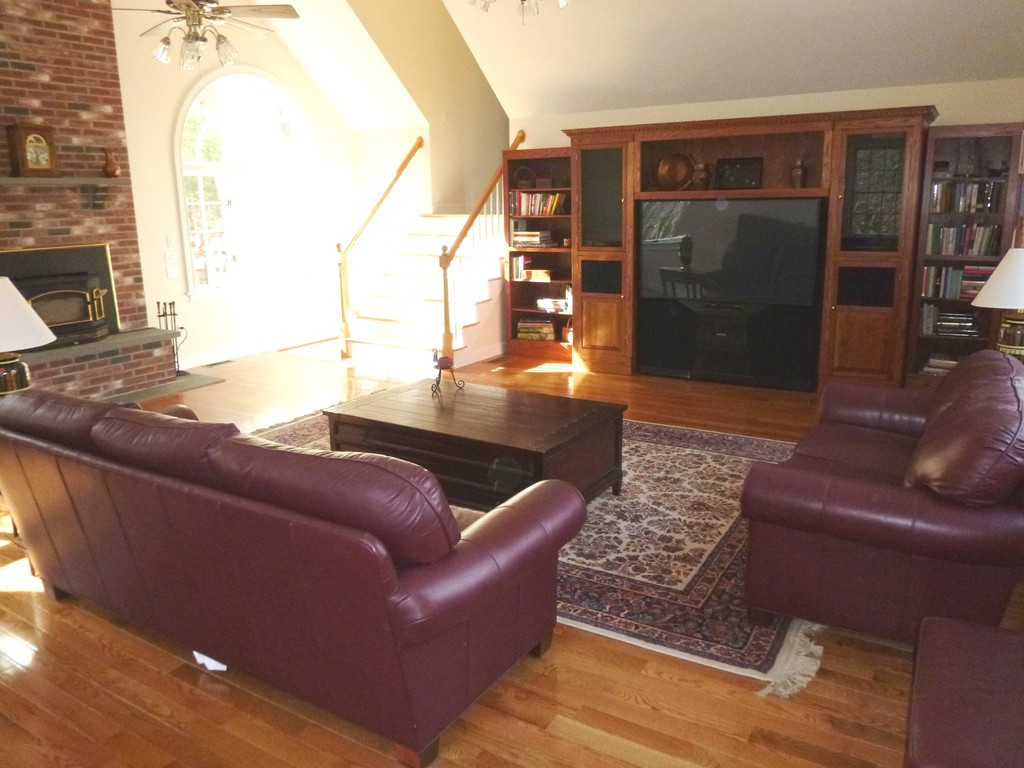 175 Robinson Road Boxborough, MA 01719 - Photo 11 of 30 a living room with furniture and a window