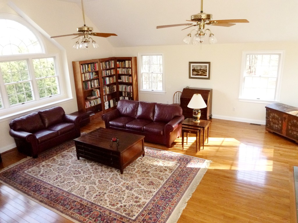 175 Robinson Road Boxborough, MA 01719 - Photo 13 of 30 a living room with furniture and wooden floor
