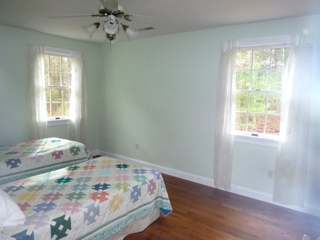 175 Robinson Road Boxborough, MA 01719 - Photo 20 of 30 a bedroom with a bed and a window