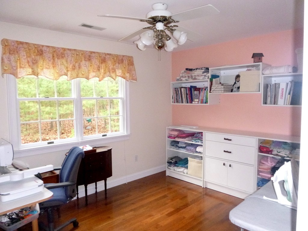 175 Robinson Road Boxborough, MA 01719 - Photo 21 of 30 a view of workspace with furniture window and wooden floor