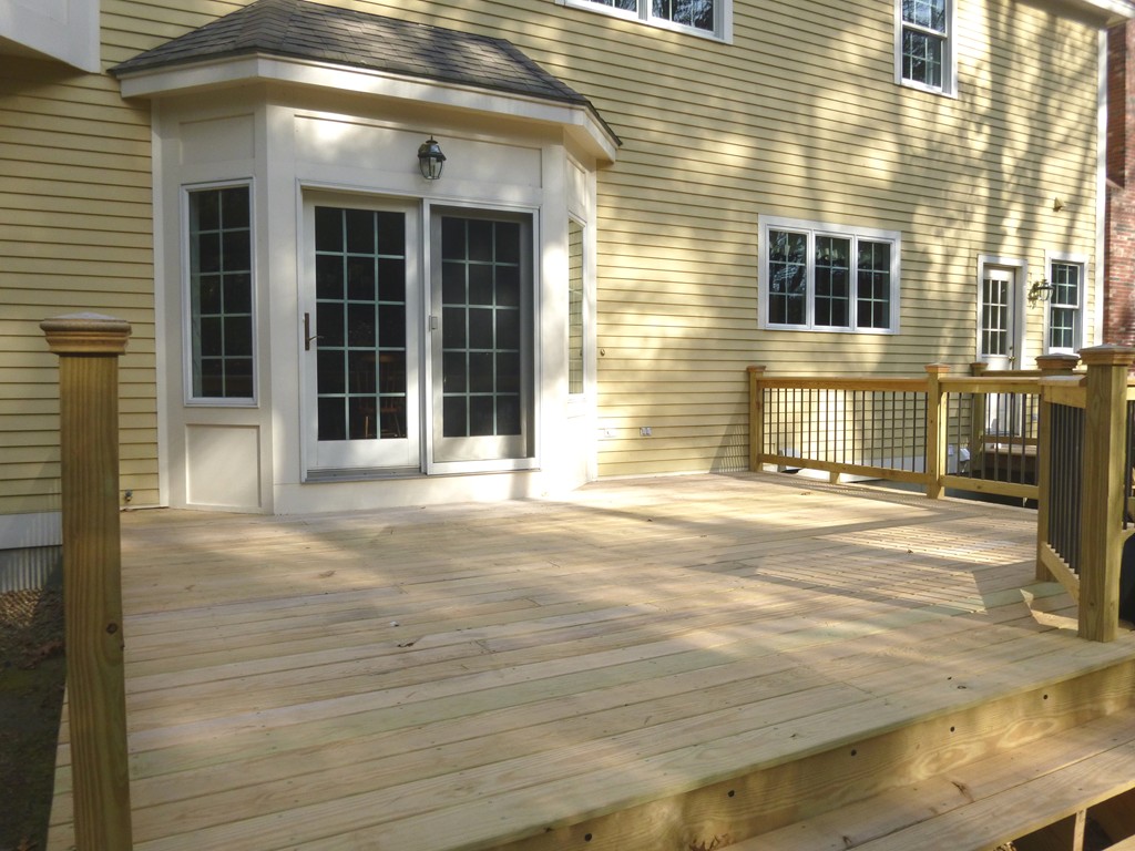 175 Robinson Road Boxborough, MA 01719 - Photo 24 of 30 a view of a brick house with a large window
