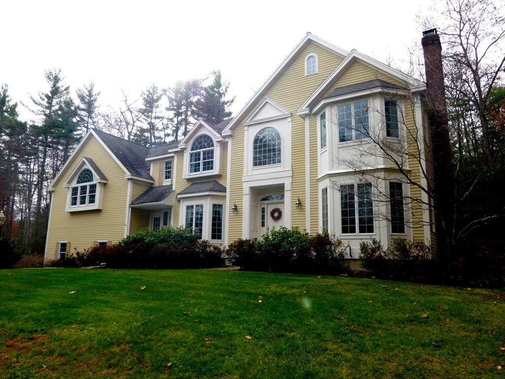 175 Robinson Road Boxborough, MA 01719 - Photo 30 of 30 a front view of a house with a garden