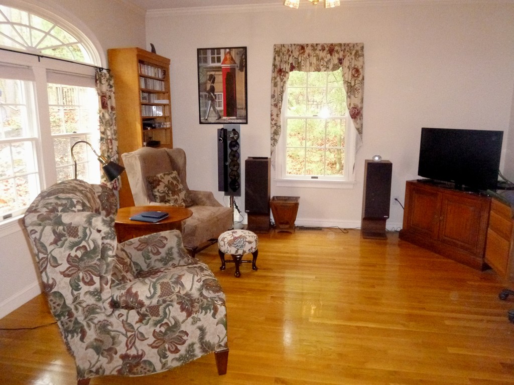 175 Robinson Road Boxborough, MA 01719 - Photo 9 of 30 a living room with furniture and a flat screen tv
