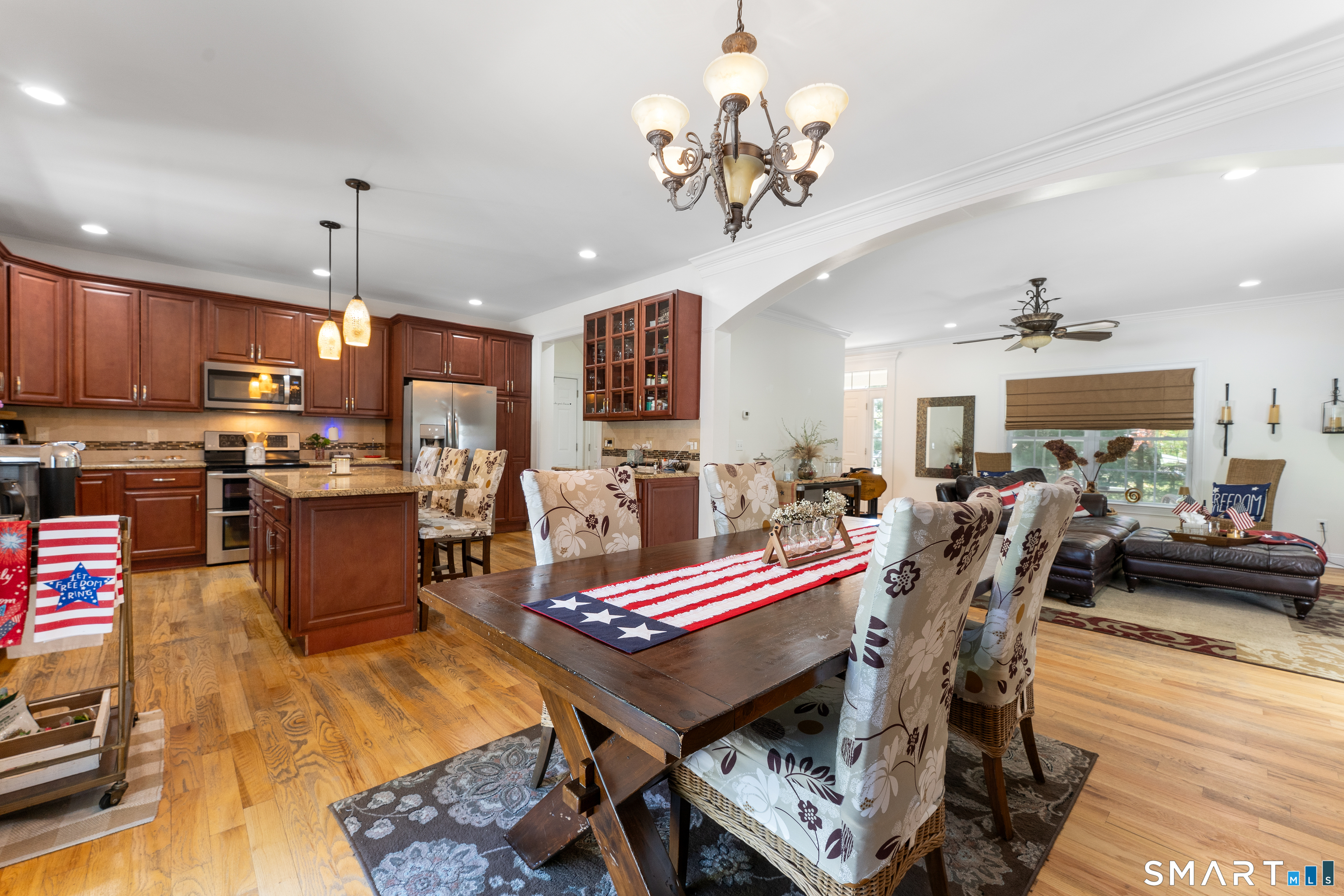 261 Spring Road North Haven, CT 06473 - Photo 15 of 39 a large kitchen with a table and chairs