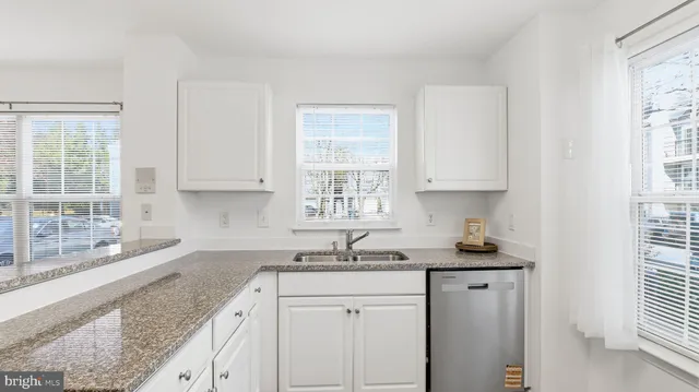 a kitchen with a stove microwave and refrigerator
