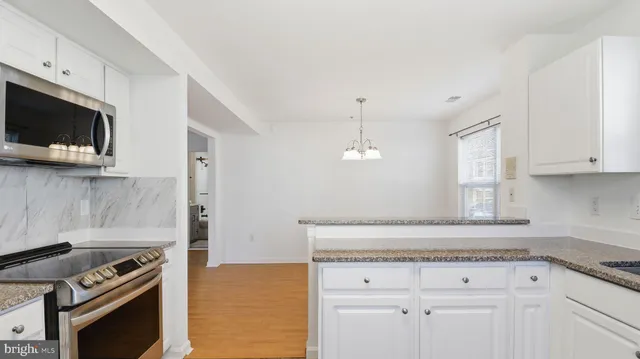 a bedroom with a bed and a television in it