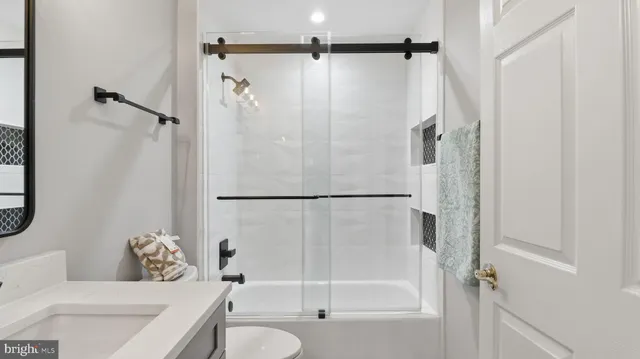 an empty room with wooden floor