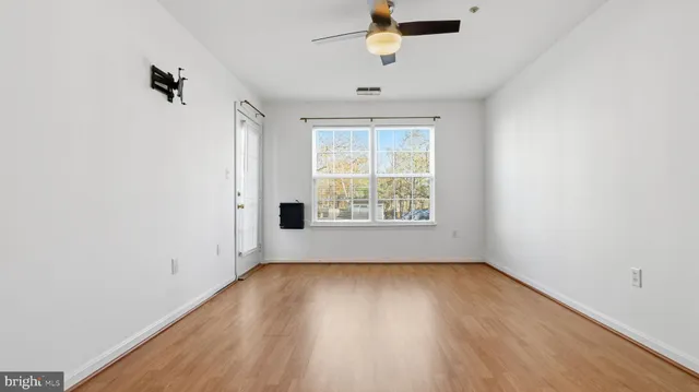 a bathroom with a shower sink and mirror