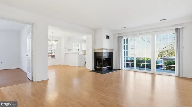 a bedroom with a bed and a fireplace