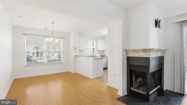 a kitchen that has a sink and a window in it