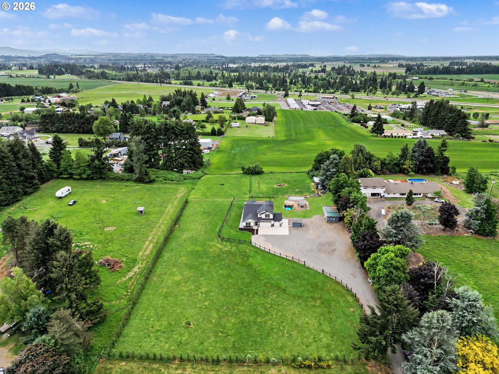 11862 Steinkamp Road Southeast Aumsville, OR 97325 - Photo 5 of 48 an aerial view of a houses with outdoor space and trees all around