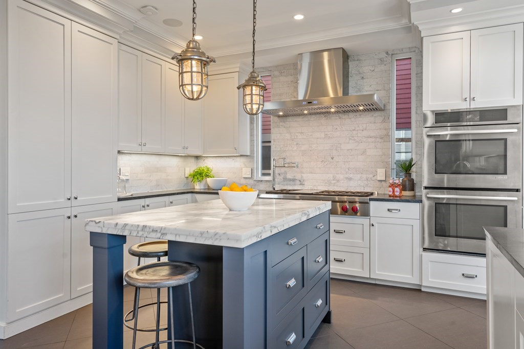 19 Salcombe Street Boston, MA 02125 - Photo 18 of 40 a kitchen with a sink appliances and cabinets