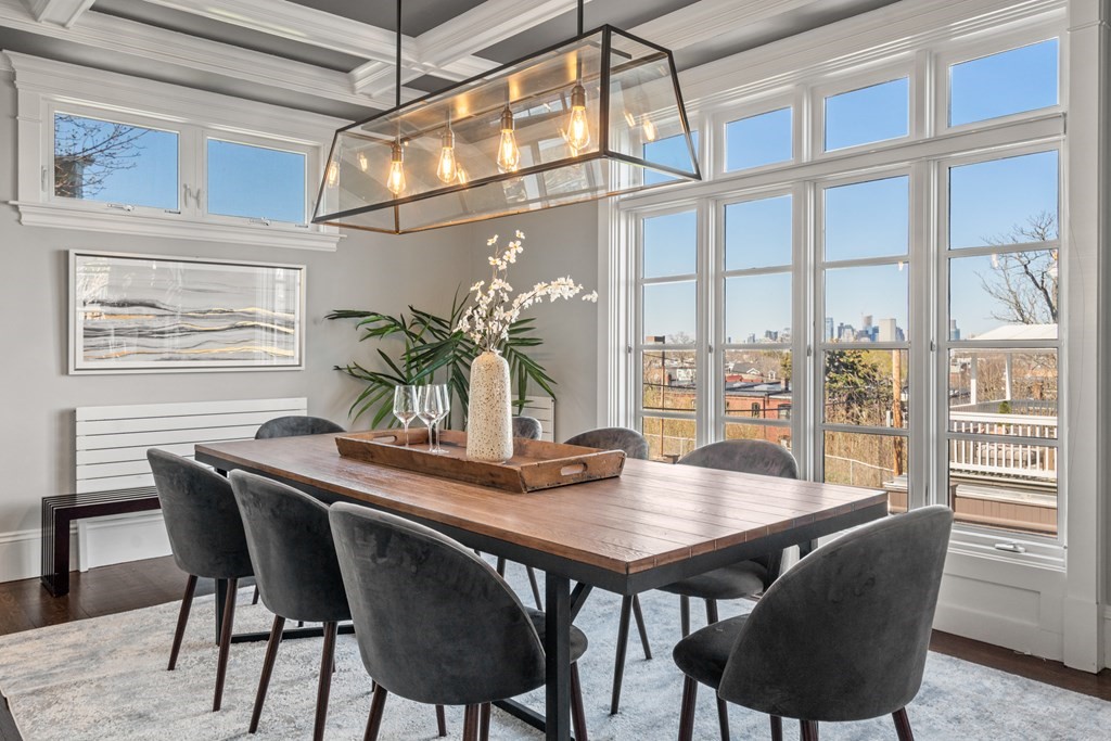 19 Salcombe Street Boston, MA 02125 - Photo 3 of 40 a view of a dining room with furniture window and wooden floor