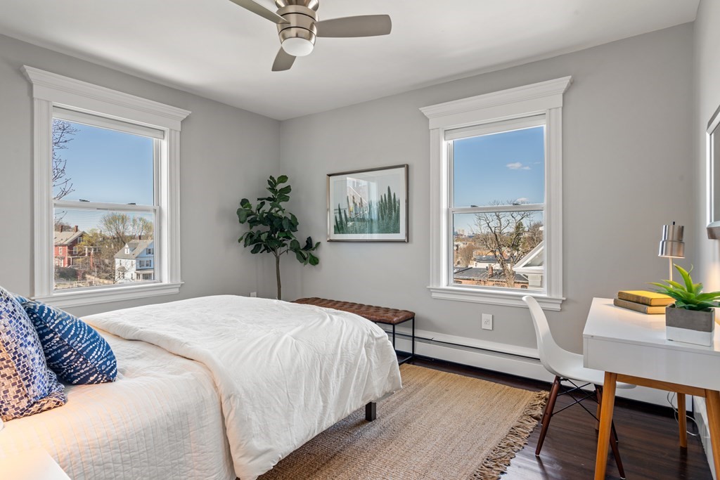 19 Salcombe Street Boston, MA 02125 - Photo 31 of 40 a bedroom with a bed furniture and a window