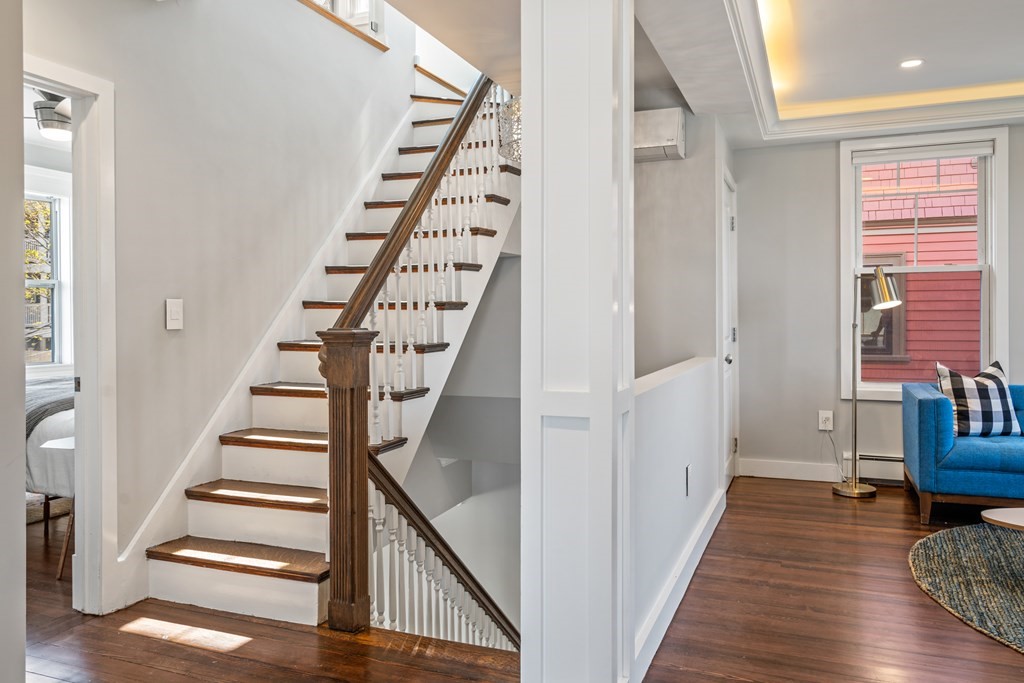 19 Salcombe Street Boston, MA 02125 - Photo 37 of 40 a view of entryway and hall with wooden floor