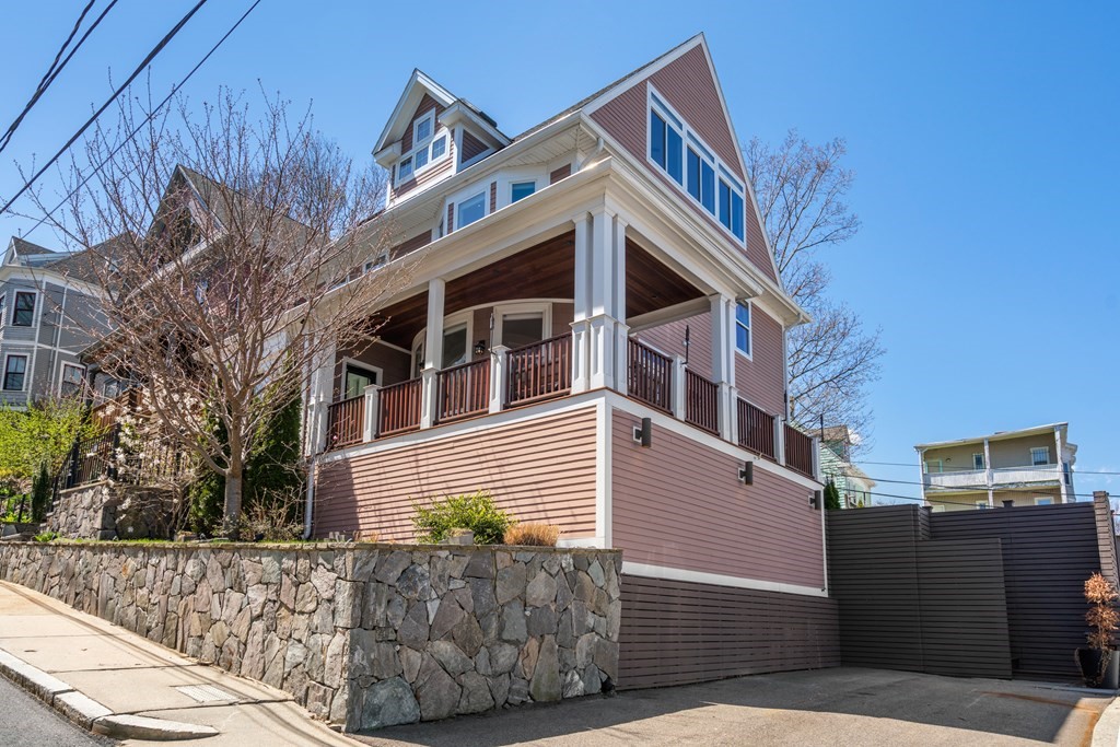 19 Salcombe Street Boston, MA 02125 - Photo 40 of 40 a view of a house with a yard