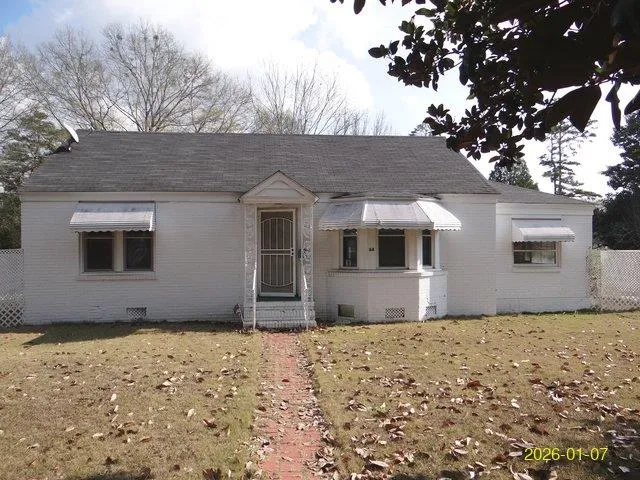 a front view of house with yard