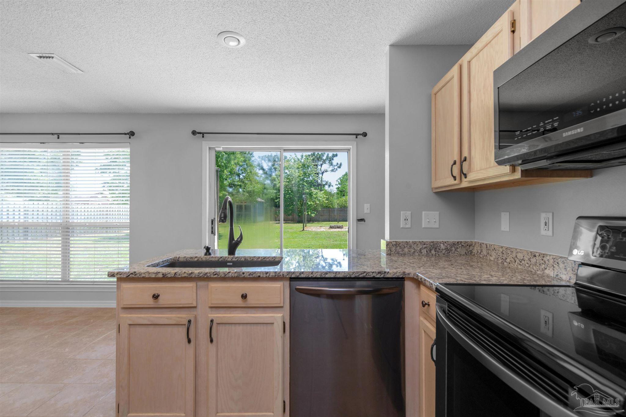 6545 Fern Street Navarre, FL 32566 - Photo 12 of 31