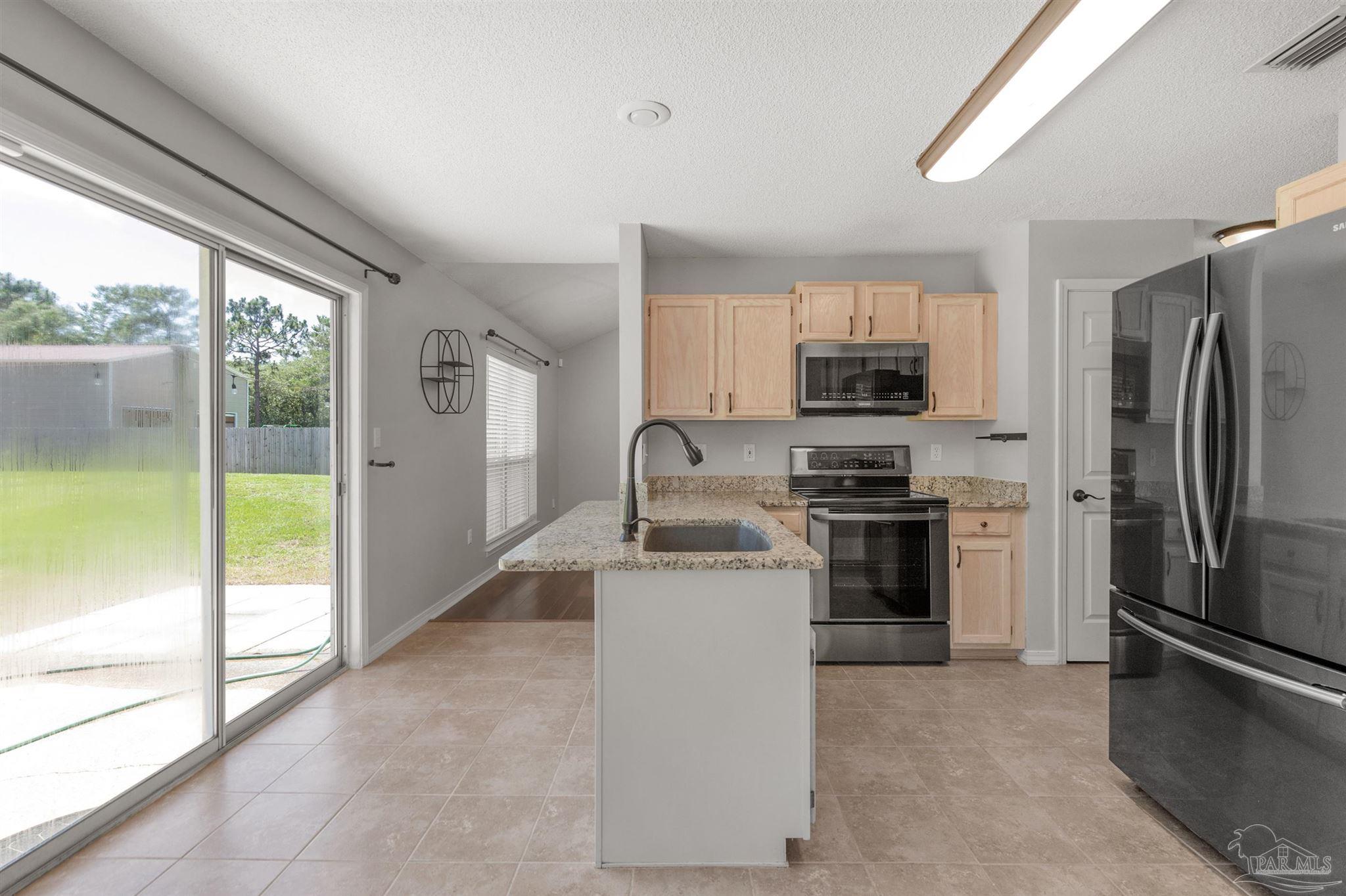 6545 Fern Street Navarre, FL 32566 - Photo 6 of 31