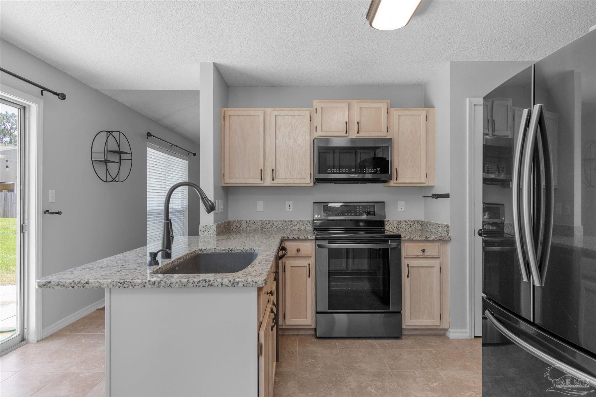 6545 Fern Street Navarre, FL 32566 - Photo 7 of 31