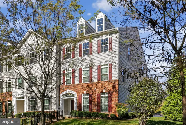 a sign broad in front of the red and white