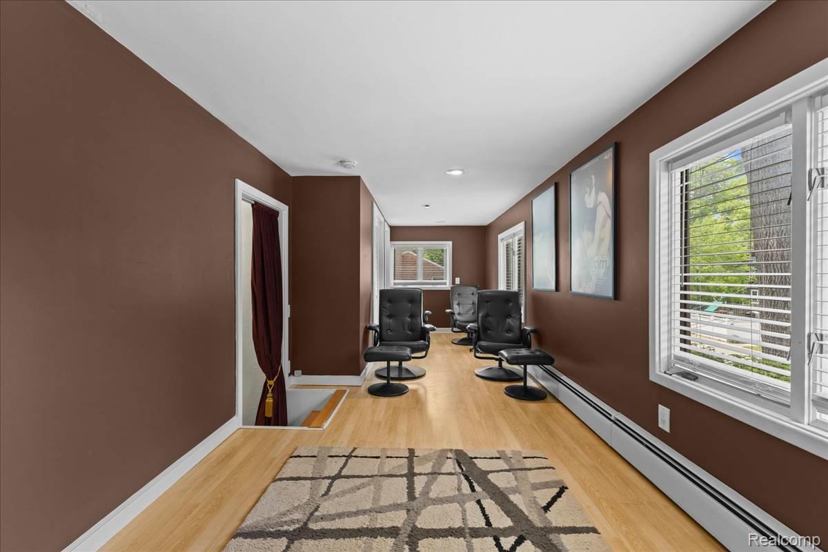 43 Wellesley Drive Pleasant Ridge, MI 48069 - Photo 15 of 52 Wood-finish flooring with crisp white trim throughout