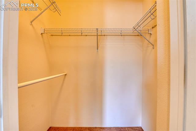 2049 Legacy Ridge View, Unit 111 Colorado Springs, CO 80910 - Photo 31 of 32 View of walk in closet