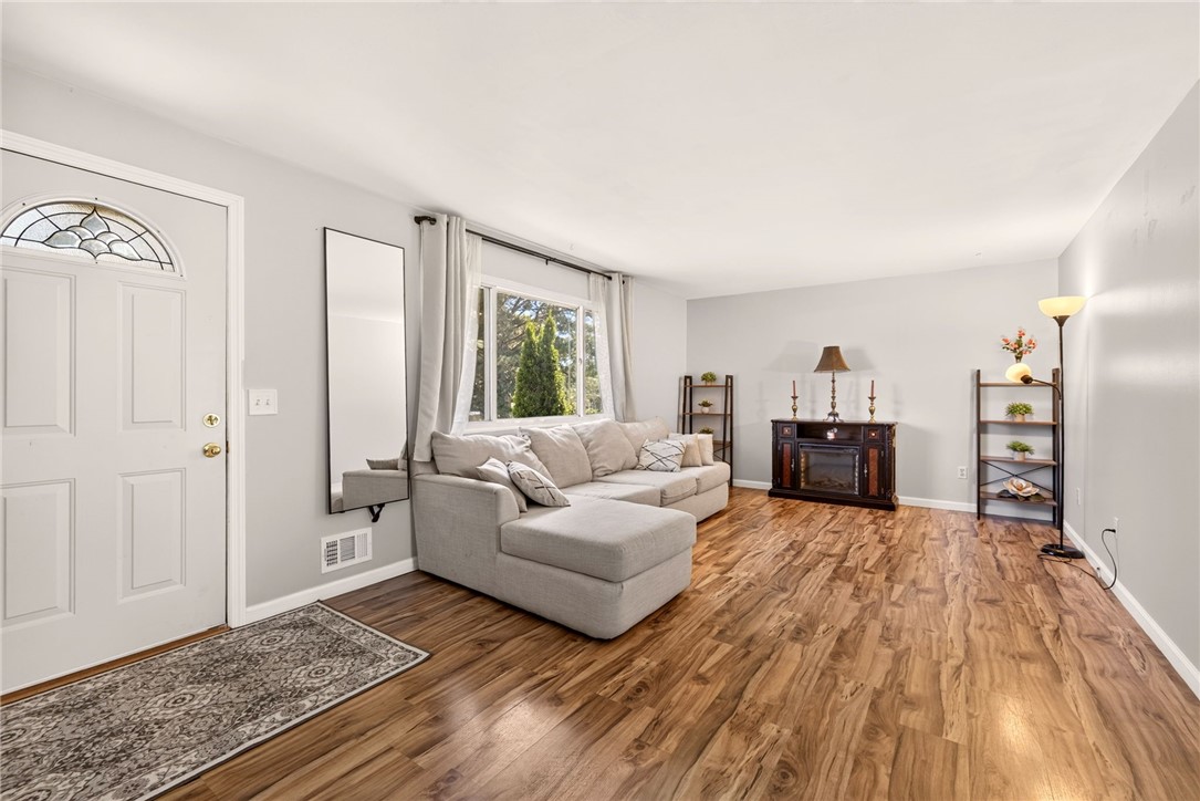 44 Friel Road Henrietta, NY 14623 - Photo 10 of 24 cozy and relaxing living room